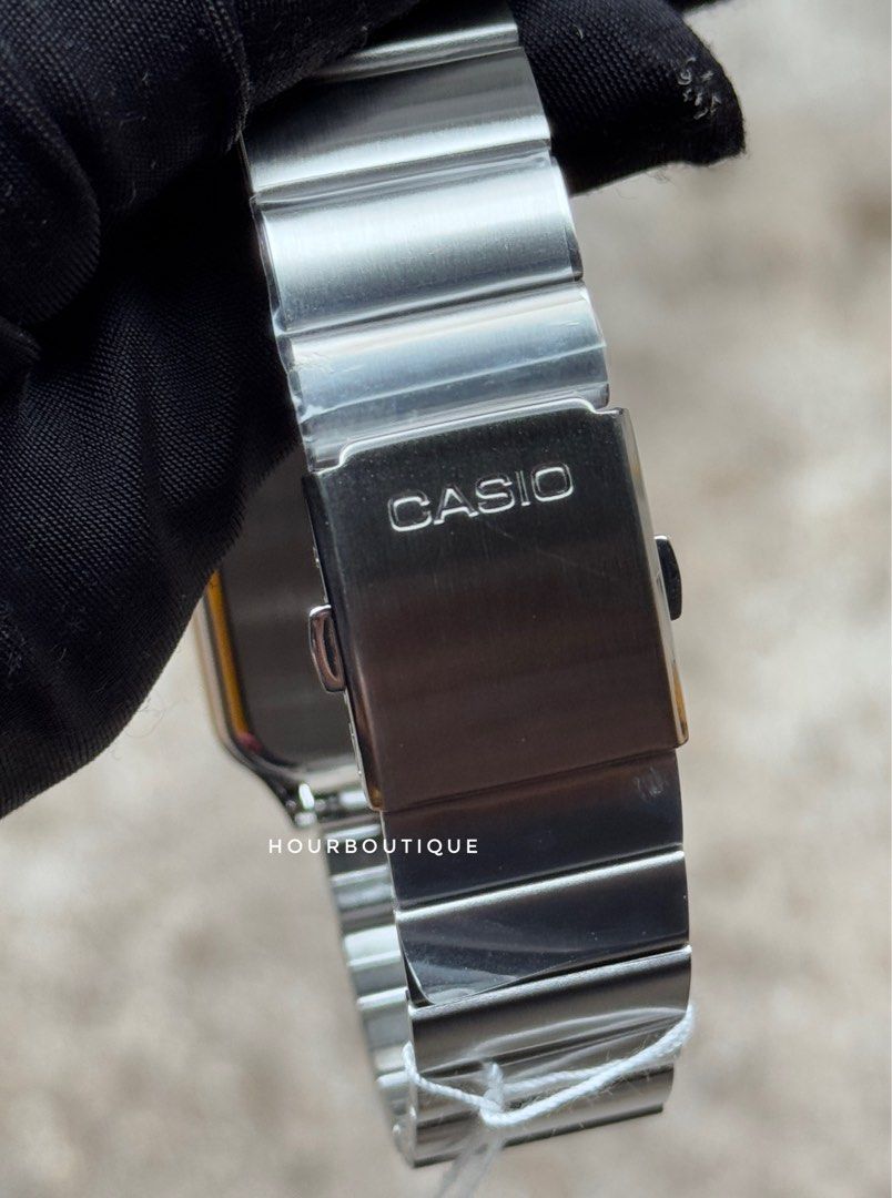 Brand New Casio Cream Dial Moon Phase Rectangular Quartz Watch MTP-M305D-9AVDF