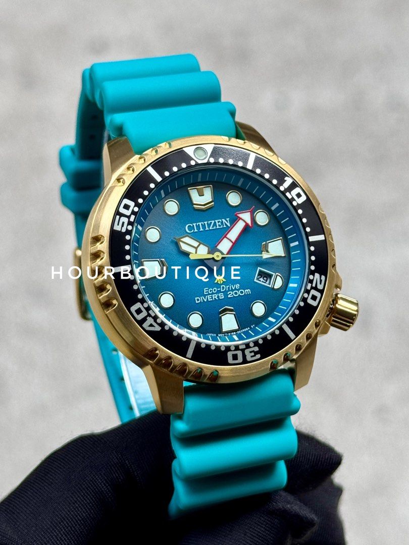 Brand New Citizen ProMaster Blue Dial, Gold Case Mens Eco-Drive Divers Watch BN1062-02X
